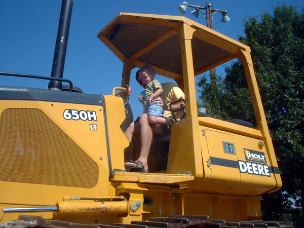Daddy and the Buddy in a bulldozer.jpg 92.7K